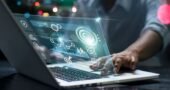 Data scientists. Male programmer using laptop analyzing and developing in various information on futuristic virtual interface screen. Algorithm. marketing and deep learning of artificial intelligence